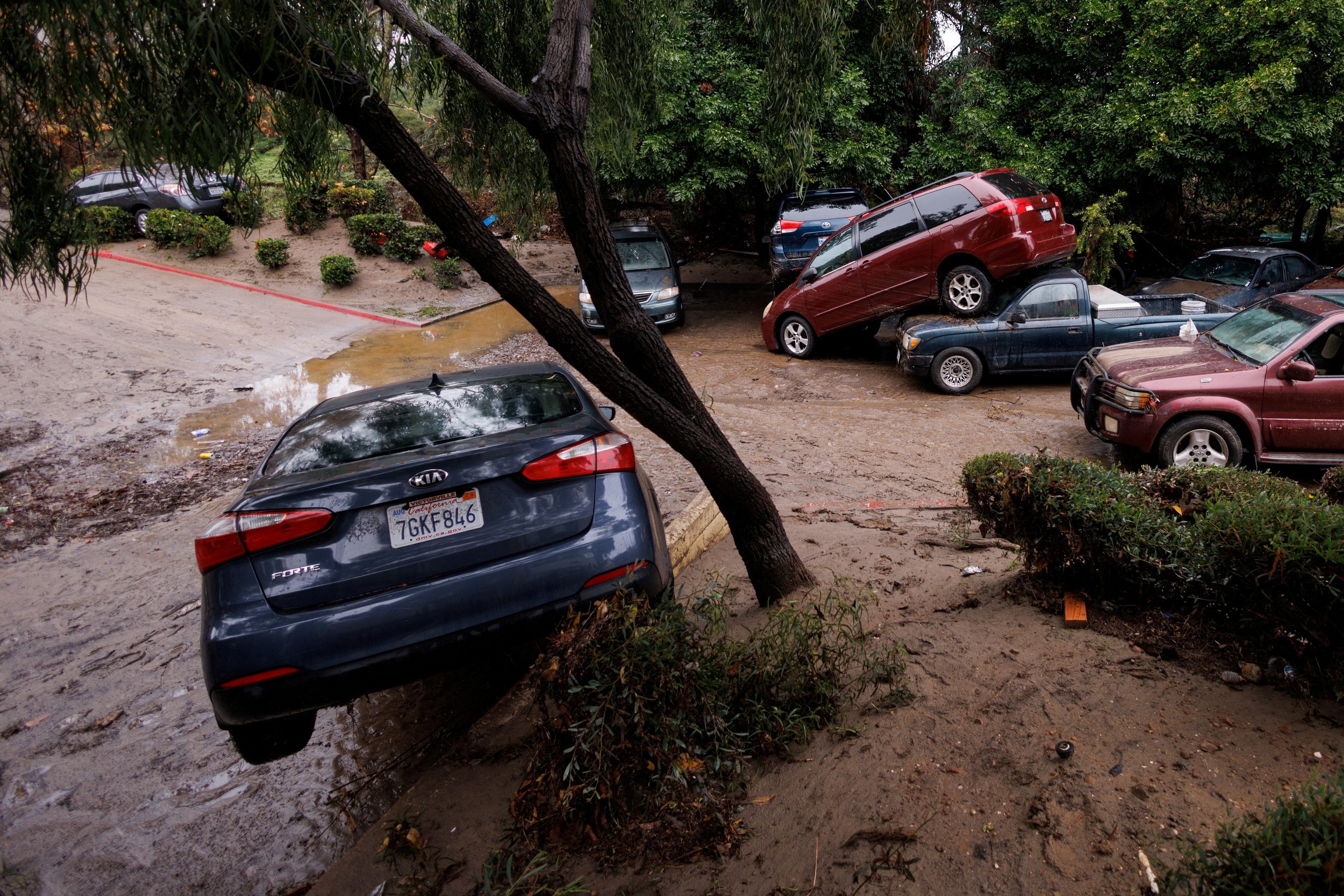 FILE PHOTO: Damage is shown after a heavy rain storm causes a small river to overflow into a neighborhood in San Diego, California, U.S. January 22, 2024.  REUTERS/Mike Blake/File Photo