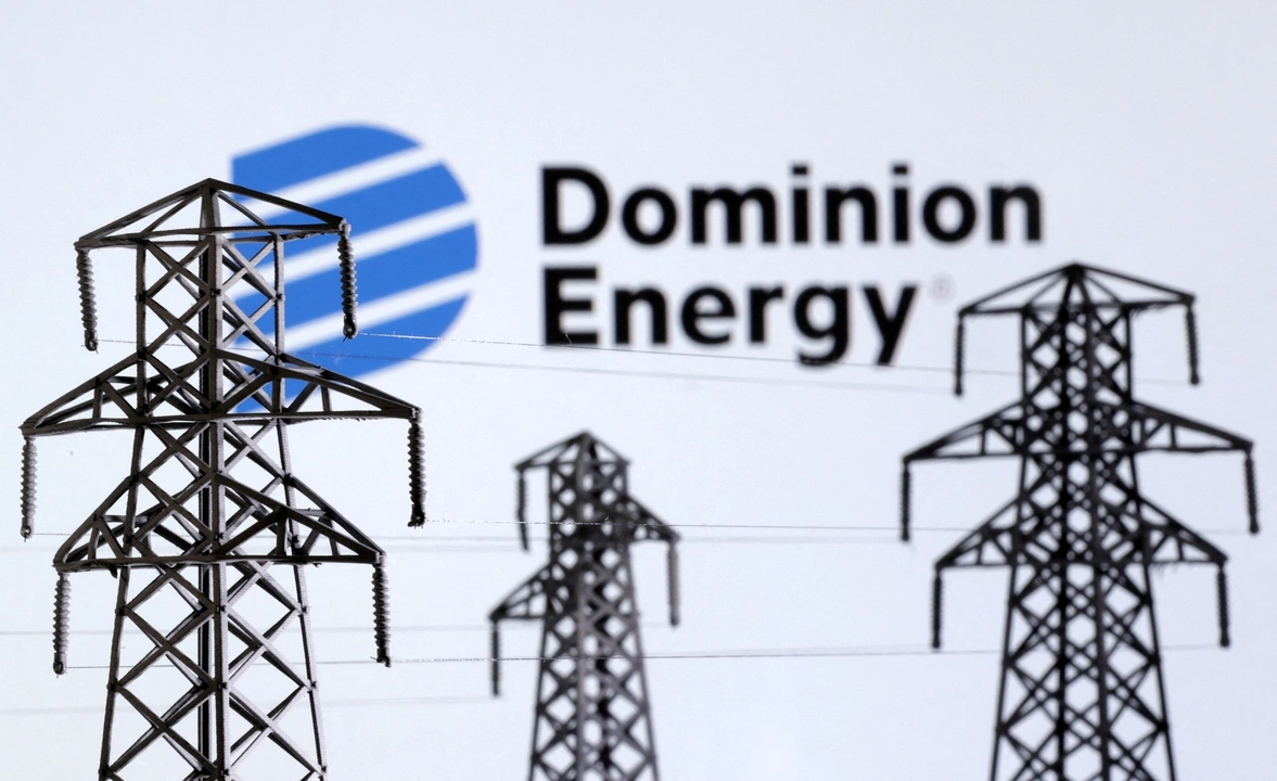 FILE PHOTO: Electric power transmission pylon miniatures and Dominion Energy logo are seen in this illustration taken, December 9, 2022. REUTERS/Dado Ruvic/Illustration/File Photo