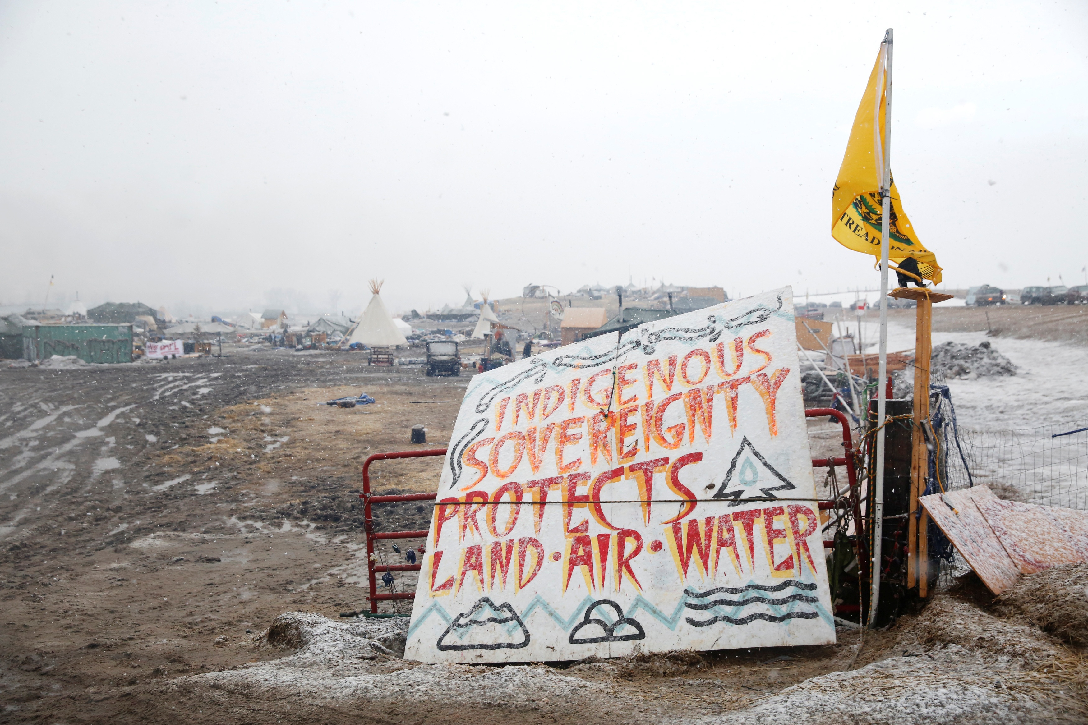FILE PHOTO: A sign stands in the entrance of the main opposition camp against the Dakota Access oil pipeline near Cannon Ball, North Dakota, U.S., February 22, 2017. REUTERS/Terray Sylvester