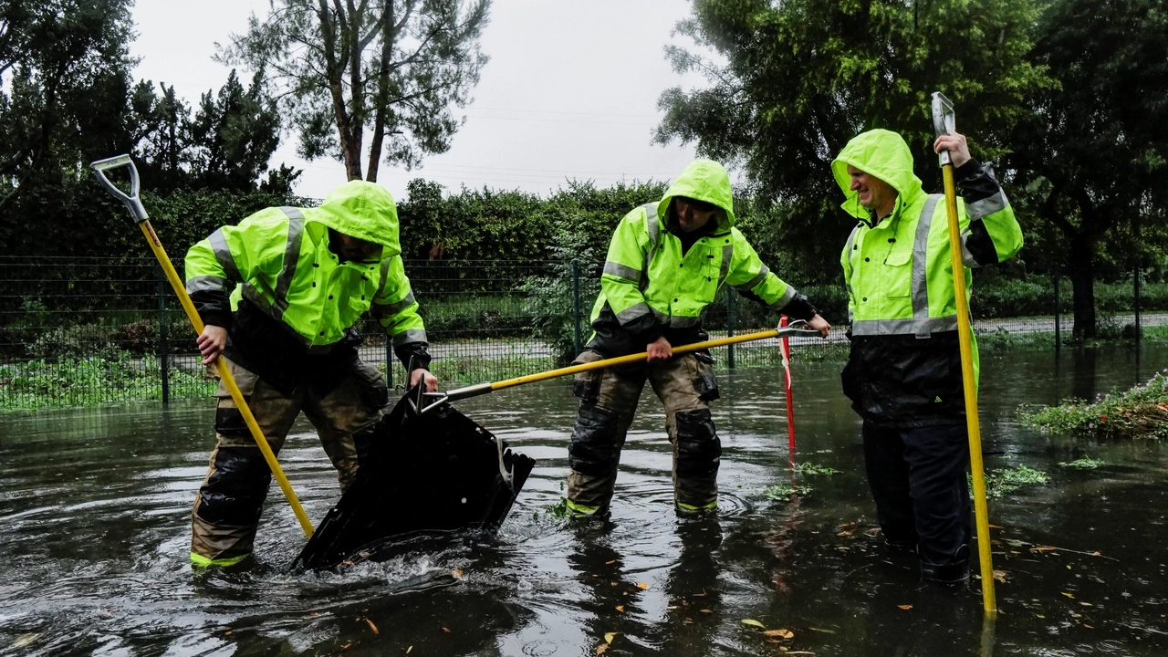 Firemen work on flooded area in Tarzana, in the San Fernando Valley region of Los Angeles, California, U.S. February 1, 2024. REUTERS/Carlin Stiehl
