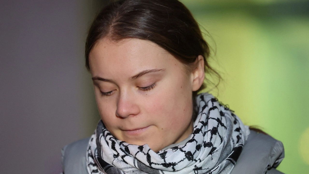 Climate activist Greta Thunberg looks on as she gives a statement outside Westminster Magistrates' Court on the day of her trial, in London, Britain, February 1, 2024. REUTERS/Isabel Infantes