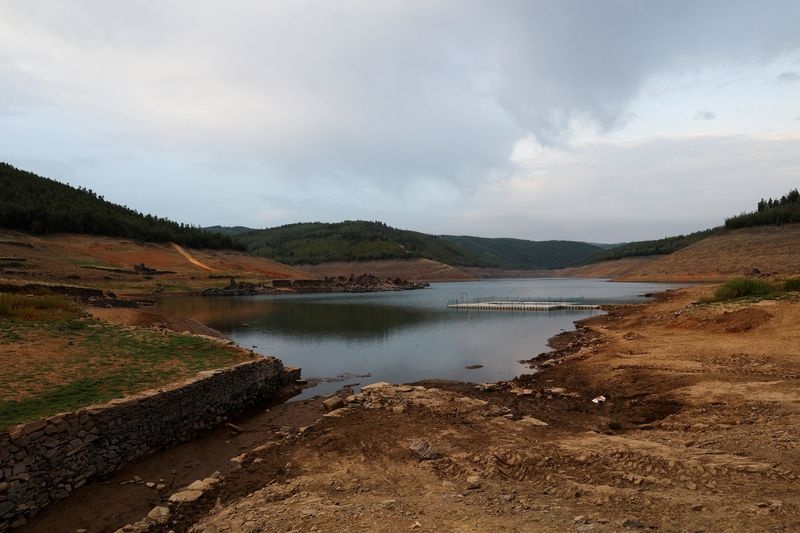 FILE PHOTO: View of a previously submerged village revealed by low water level in Cabril dam reservoir in Pedrogao Grande, Portugal, July 13, 2022. REUTERS/Rodrigo Antunes/File Photo