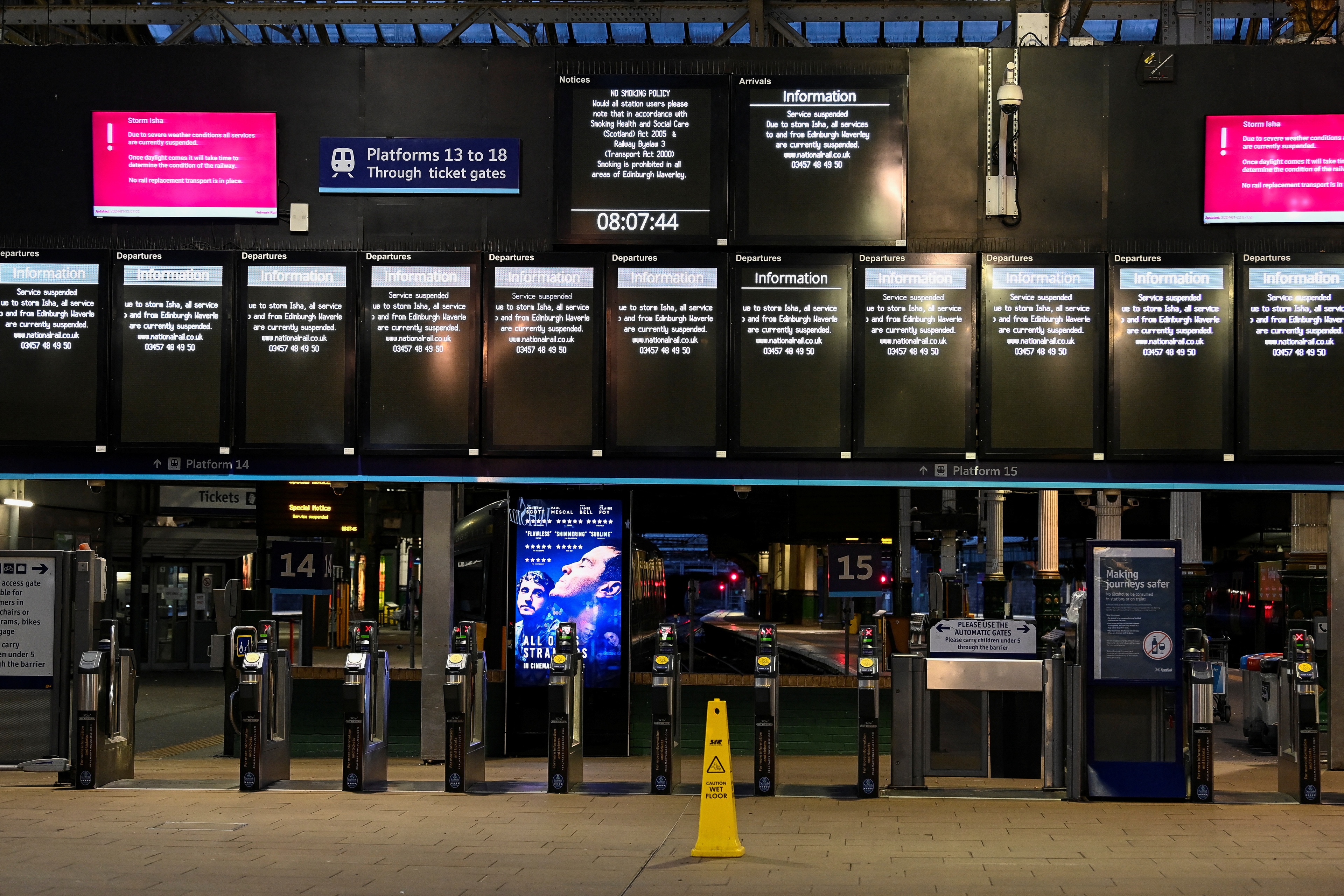 Information boards display delayed and cancelled train services at Edinburgh Waverley Station in the aftermath of Storm Isha in Edinburgh, Britain January 22, 2024. REUTERS/Lesley Martin